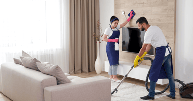 cleaning team disinfecting home
